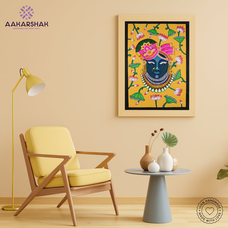 Artisan-made Pichwai painting featuring symmetrical designs and cultural symbolism