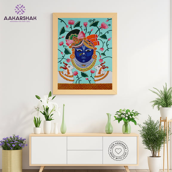 Close-up of hand-painted Pichwai design using vibrant colors and natural themes

