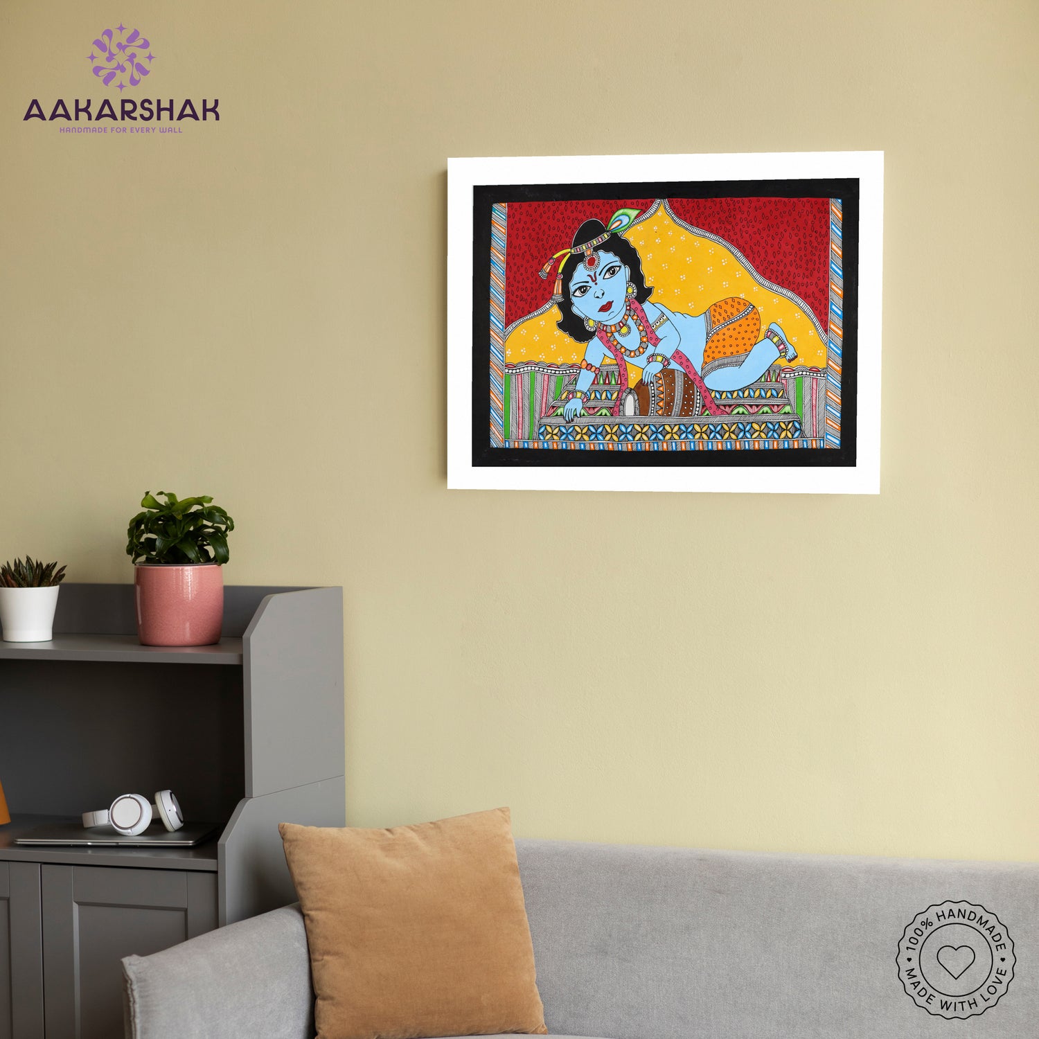 Traditional Indian wall painting displayed in modern home interior setting
